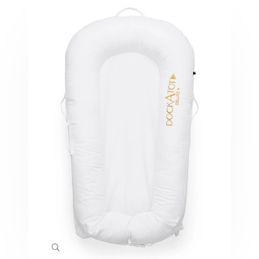 The DockATot Deluxe+ Pristine White gently used